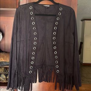 Faux suede jacket with grommets and fringe